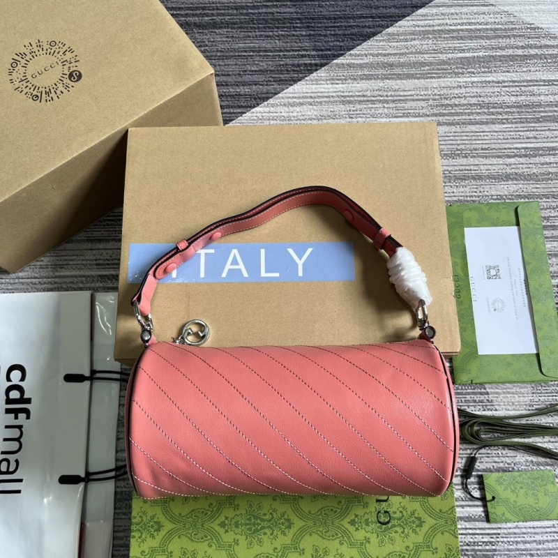 G*u*i round bags